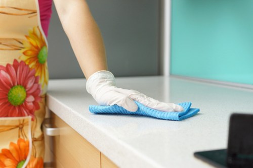 Carpet cleaning team preparing equipment safely